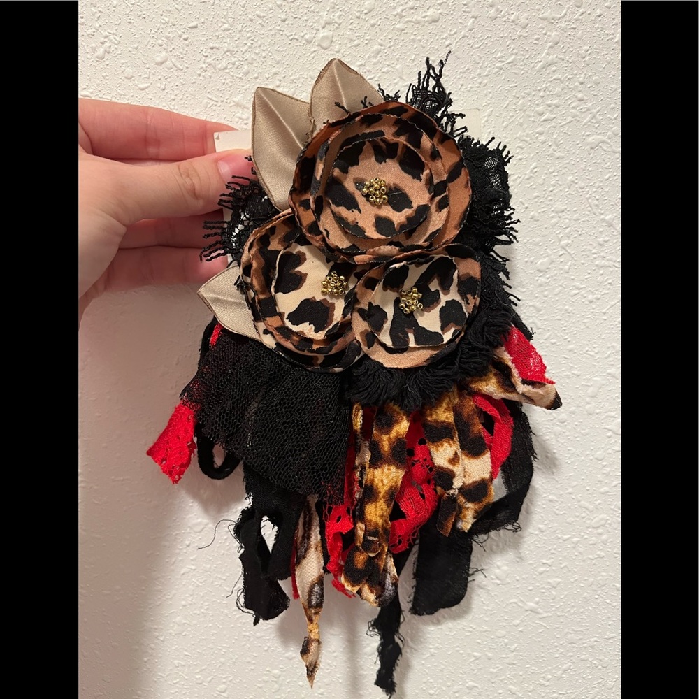 Stunning black red and leopard flower pin